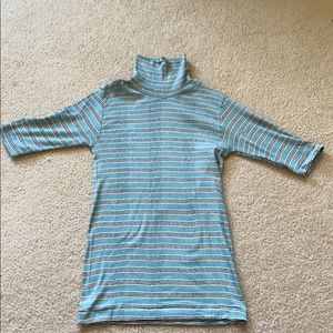 Edith A. Miller Turtle Neck